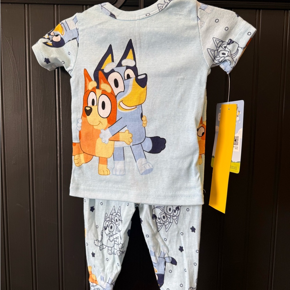 Blue and Orange Pajama Sets with Playful Cartoon Design